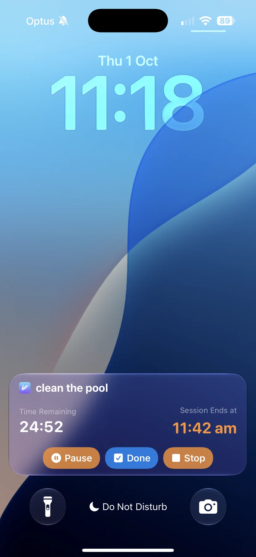 iPhone Lock Screen showing an iFocusFlow focus-session Live Activity for the task “clean the pool”, with 24:52 remaining and pause, done and stop controls